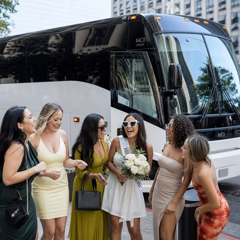 Passengers loading luggage while boarding an San Francisco group shuttle