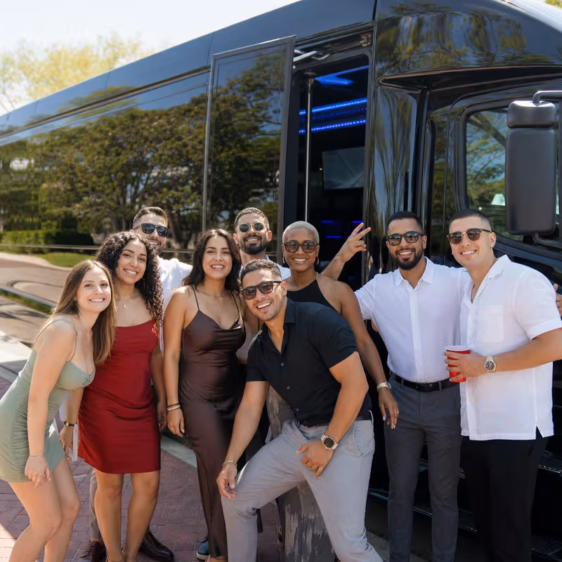 Party bus interior with wraparound leather seating and LED lighting in San Francisco
