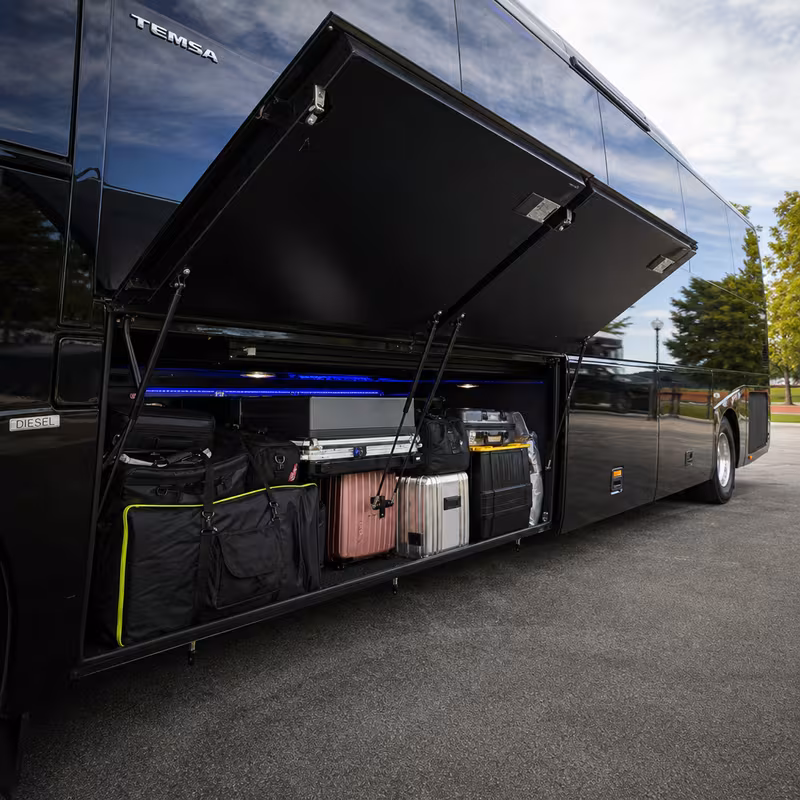 Party bus interior with wraparound leather seating and LED lighting in San Francisco
