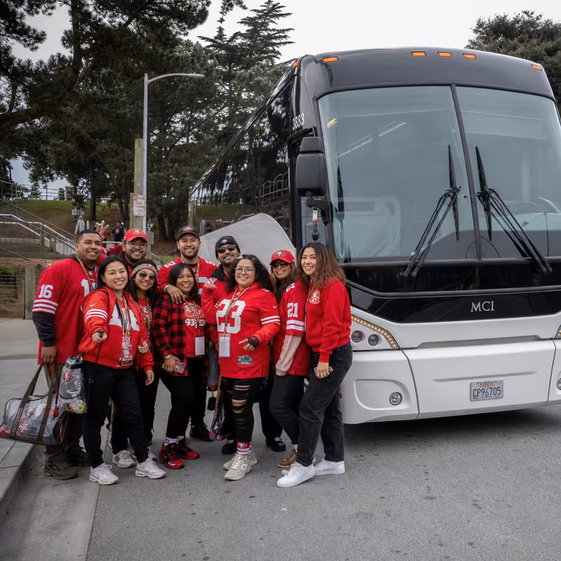 Passengers loading luggage while boarding an San Francisco group shuttle