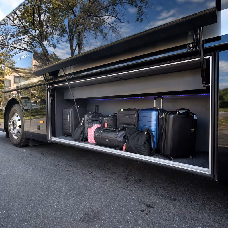Party bus interior with wraparound leather seating and LED lighting in San Francisco